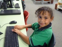 Student sitting at a computer